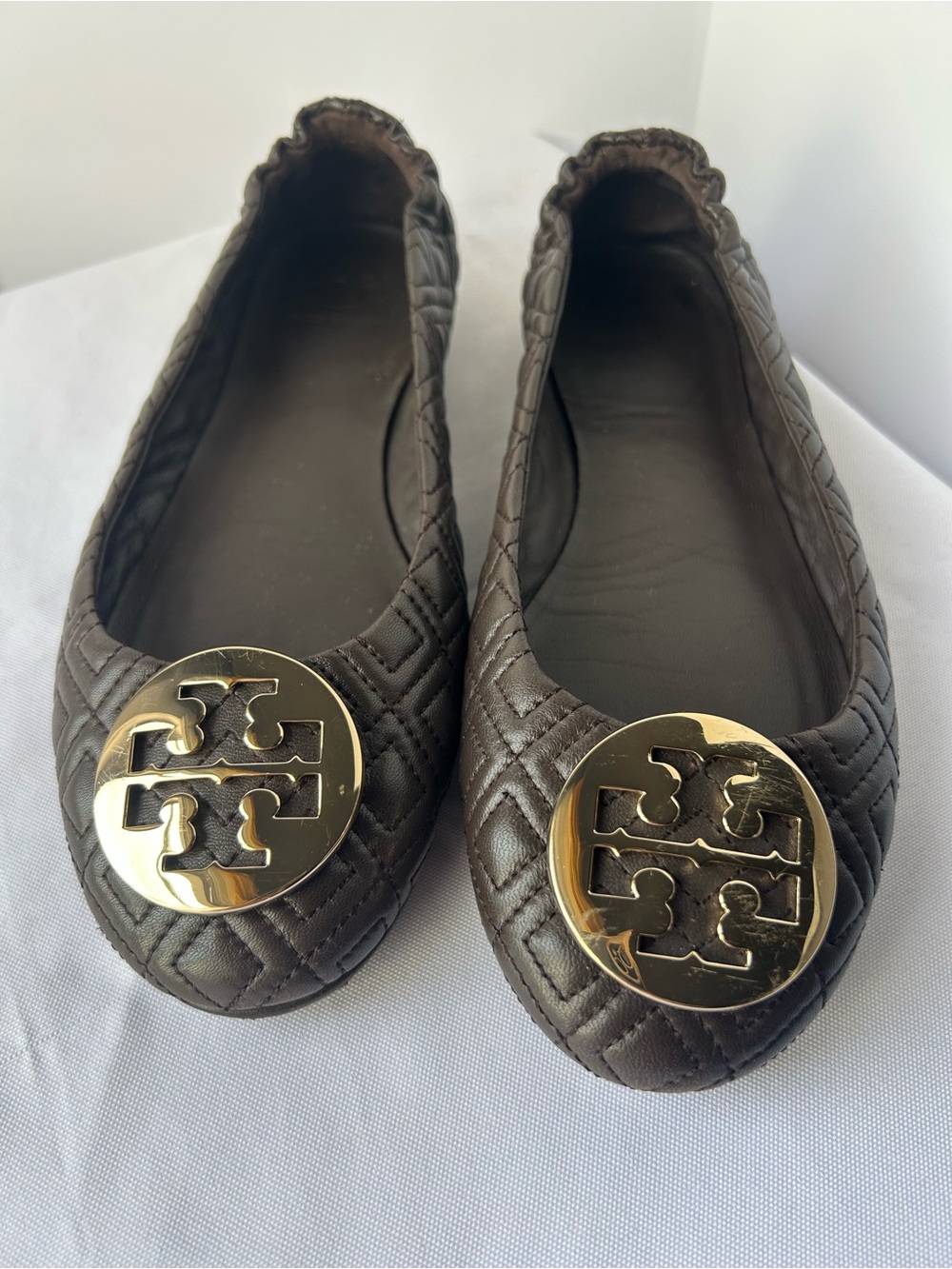 Tory Burch Dark Brown Quilted Logo Ballet Flats with Gold Medallions